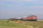 Die 218 345-7 mit einer Schwesterlok am 21.08.2011 bei Schellinghrn.