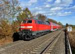 218 427 mit IRE 4225 von Stuttgart Hbf nach Lindau Hbf am 03.11.2012 unterwegs bei Friedrichshafen-Flughafen.