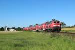 218 498-4 mit einem Regionalexpress nach Frankfurt in Glauburg-Glauberg am 01.08.2012