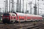 218 498 am 27.7.12 mit einem RE bei der Einfahrt in Frankfurt Hbf.