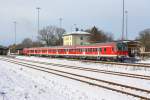 Eine 218 schiebt ihren Regionalzug aus Kaufering Richtung Mnchen - 06/02/2013