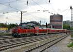 218 418 mit einem RE nach Mhldorf am 29.04.2012 bei der Einfahrt in Mnchen Ost.