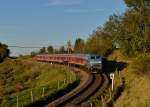 218 467 mit einem RE nach Fssen am 19.10.2013 bei Leuterschach.