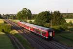 Das ist noch richtige Eisenbahn! Eine 218 mit 3 Bn-Wagen auf ihrem Weg von München nach Mühldorf am Abend des 13.06.14 bei Heimstetten.