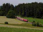 Die 218 486 mit einer RB nach Füssen am 19.07.2014 unterwegs bei Leuterschach.