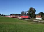 Die 218 488 mit einem RE nach Füßen am 09.10.2014 unterwegs bei Tannenmühle.