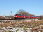 Die 218 410 mit einem IRE nach Lindau am 05.01.2015 unterwegs bei Mochenwangen.