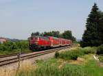 Die 218 439 mit einem IRE nach Lindau am 04.07.2015 unterwegs bei Schweinhausen.