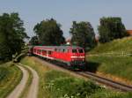 Die 218 425 mit einem RE nach Memmingen am 03.07.2015 unterwegs bei Stetten.