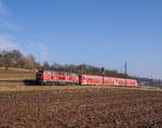 218 495 mit einem 611er im Schlepp auf der Filsbahn Richtung Stuttgart.(Ebersbach 19.2.2017)