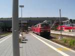 218 432-3 mit RE 21416 kurz vor der Abfahrt nach Lbeck- Travemnde- Strand. 31.05.08.