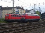Die 218 838-1 rangierte am 08.05.2010 in Aachen Hbf, im hintergrung stand 110 210-2 abgestellt.