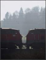 Im Doppelpack -     Mit zwei 218er Dieselloks ist hier ein Intercity-Zug bei Lonsee auf der Schwäbischen Alb unterwegs.