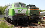 218 493-5 D-AIX , Unternehmen X-Rail , über den Zaun auf dem Gelände der WISAG abgelichtet.