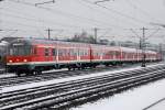 Die 218 472-9 mit RB aus Buchloe nach München Hbf am Hirschgarten am 15.02.2013