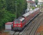 Betankung (|) - Planmäßig wäre 218 410-9 mit ihren Wagen zum Zeitpunkt der Aufnahme im Bahnhof von Lindau gewesen.