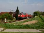 Die 218 404 mit einem IC Rottalerland Ersatzzug am 19.04.2014 unterwegs bei Sulzbach am Inn.