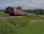 Kurz nach dem Gleiswechsel von der KBS 970 auf die KBS 753 und dem Passsieren des Bahnhofs von Hergatz befinden sich 218 421-6 und 218 454-7 mit dem EC 195 von Zürich am 15.06.2014 auf der Fahrt nach