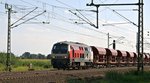 218 117 der Heros Rail Rent mit einem Schüttgutwagenzug in Richtung Bremen durch Diepholz am 31.08.16.