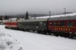 119 158-4 am 28.02.09 mit einem Sonderzug aus DR und DB Wagen im Bahnhof Cranzahl.
