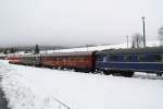 119 158-4 am 28.02.09 mit einem Sonderzug aus DR und DB Wagen im Bahnhof Cranzahl.