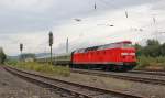 219 084-1 kam am 12.09.2012 mit zwei Personenwagen am Haken in Richtung Sden durch Eschwege West.