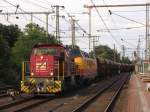 D23 (270 011-6) und D20 (ehemalige DB 221 147-2) der Bentheimer Eisenbahn AG mit Gterzug 229 Coevorden Heege (die Niederlande)-Bad Bentheim auf Bahnhof Bentheim  am 11-7-2012.