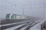 Im Morgennebel, fährt das Steiermarkbahn Tandem 1223 004 und 2016 901, mit dem stark verspätetem SKGAG 96488, von Graz Ostbahnhof nach Zeltweg. 
Knittelfeld 28.12.2017