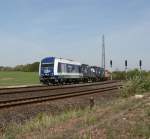 IntEgro 223 144 mit einen Containerzug am Haken fhrt am 06.05.2011 durch Gutenfrst nach Hof(Hbf.).