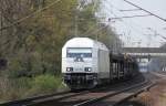 223 154 der PCT bringt einen leeren Autotransportzug in Richtung Seelze. Aufgenommen am 17.04.2012 in Dedensen-Gmmer.