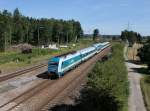 Die 223 069 mit einem ALEX nach Mnchen am 12.08.2012 bei der Durchfahrt in Irrenlohe.