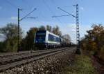 223 144 mit einem Kesselzug am 24.10.2013 bei Plattling.