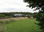 223 144 und 223 152 sind mit einem Kesselzug am 16.06.14 in Oberjößnitz zusehen.