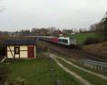 Hochfrankenexpress auf dem Weg von Nürnberg nach Magdeburg, gezogen von 223 144 und der 111 202-8, gesehen am 11.04.2014 in Jößnitz