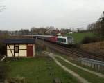 Hochfrankenexpress auf dem Weg von Nürnberg nach Magdeburg, gezogen von 223 144 und der 111 202-8, gesehen am 11.04.2014 in Jößnitz