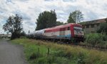 Am 20.07.2016 fuhr die 223 032 mit einem Kesselzug durch Wiesau.