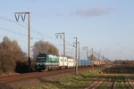 223 156 der Eisenbahngesellschaft Ostfriesland-Oldenburg mbH (EGOO) mit einem Containerzug nach Emden bei Gandesum am 11-12-2015.