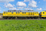 Ludmilla 232 550 der Bahnbaugruppe bei bei Roßlau am 21.04.26 nach Magdeburg. 