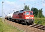 232 128-9 hat mit dem FE45429 den Hbf Stralsund fast erreicht.