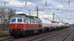 DB Cargo AG, Mainz mit ihrer  232 531-4  (NVR:  92 80 1232 531-4 D-DB ) und einem gemischten Kesselwagenzug Richtung Rbf. Seddin am 11.03.24 Höhe Bahnhof Saarmund.