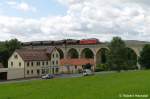 232 093-5 mit einem Schotterzug am 23.07.2011 in Putzkau