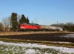 Die 232 535 mit einem Kesselzug am 20.02.2015 unterwegs bei Tüßling.