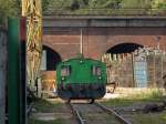 Die Kf von Theo Steil am 23.09.2011 auf dem Schrottplatz in Eschweiler Aue. Auf dem Viadukt im hintergrund verluft dei Strecke Aachen-Kln (KBS480). Das Bild wurde vom Brgersteig der Phnixstrasse durch den Zaun der Firma gemacht (siehe Geoposition)