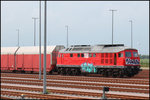 Die 318 der MEG hat soeben ein Leerzug mit Hccrrs Wagen der ATG (jetzt DB-Schenker Rail Automotive GmbH) zum Jade-Weser-Port gebracht.