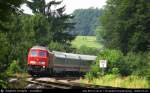 Auf die Minute nach Plan kommt 234 551-0 mit IC 119 von Dortmund nach Innsbruck. Hier auf der Sdbahn bei Ravensburg am 22. Juli 2005 