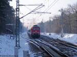 EC Berlin-Warschau Express mit Zuglok 234 467 am 28.1.2006 in Fangschleuse.