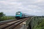 DB 246 206-8 überquert den Nord-Ostsee-Kanal über die Hochbrücke Hochdonn am 02.06.2022 mit ihrem RE6 von Hamburg-Altona nach Westerland(Sylt).