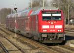 245 002 am 22.12.2016 mit RE bei der Ausfahrt aus Buchloe Richtung München.