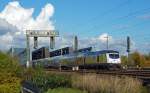 246 003-8 am 27.10.2012 mit einem ME oder MEr von Hamburg Hbf nach Cuxhaven bei den hamburger Sderelbbrcken.