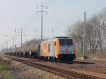 246 001-2 der hvle mit einem Güterzug Kesselwagen am 30. März 2014 auf dem südlichen Berliner Außenring bei Diedersdorf.